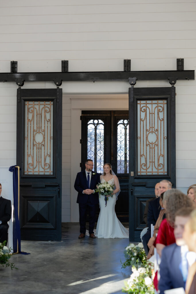 Audrey and Collin's ceremony at The Black Oak Venue in Sulphur Springs